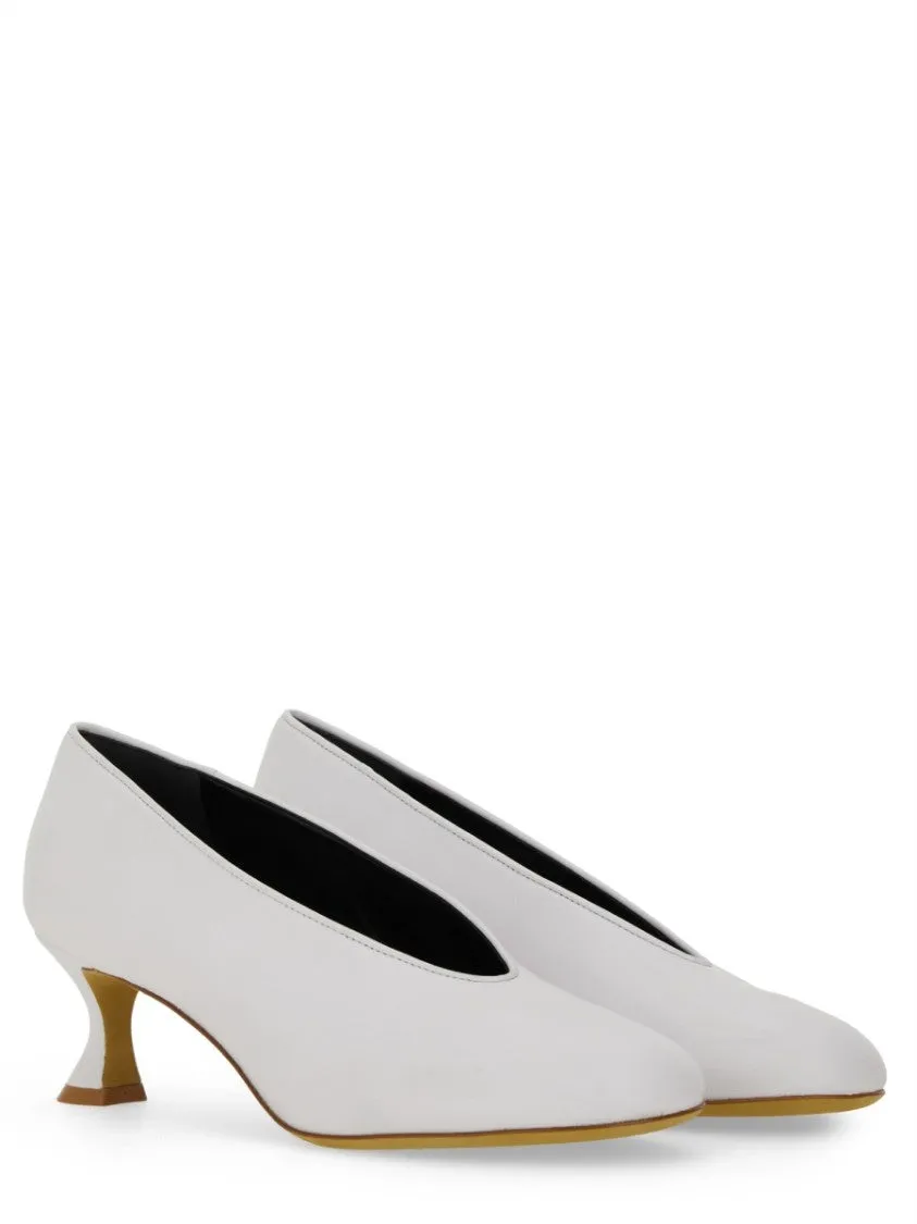 Decollete "Duck" Pumps