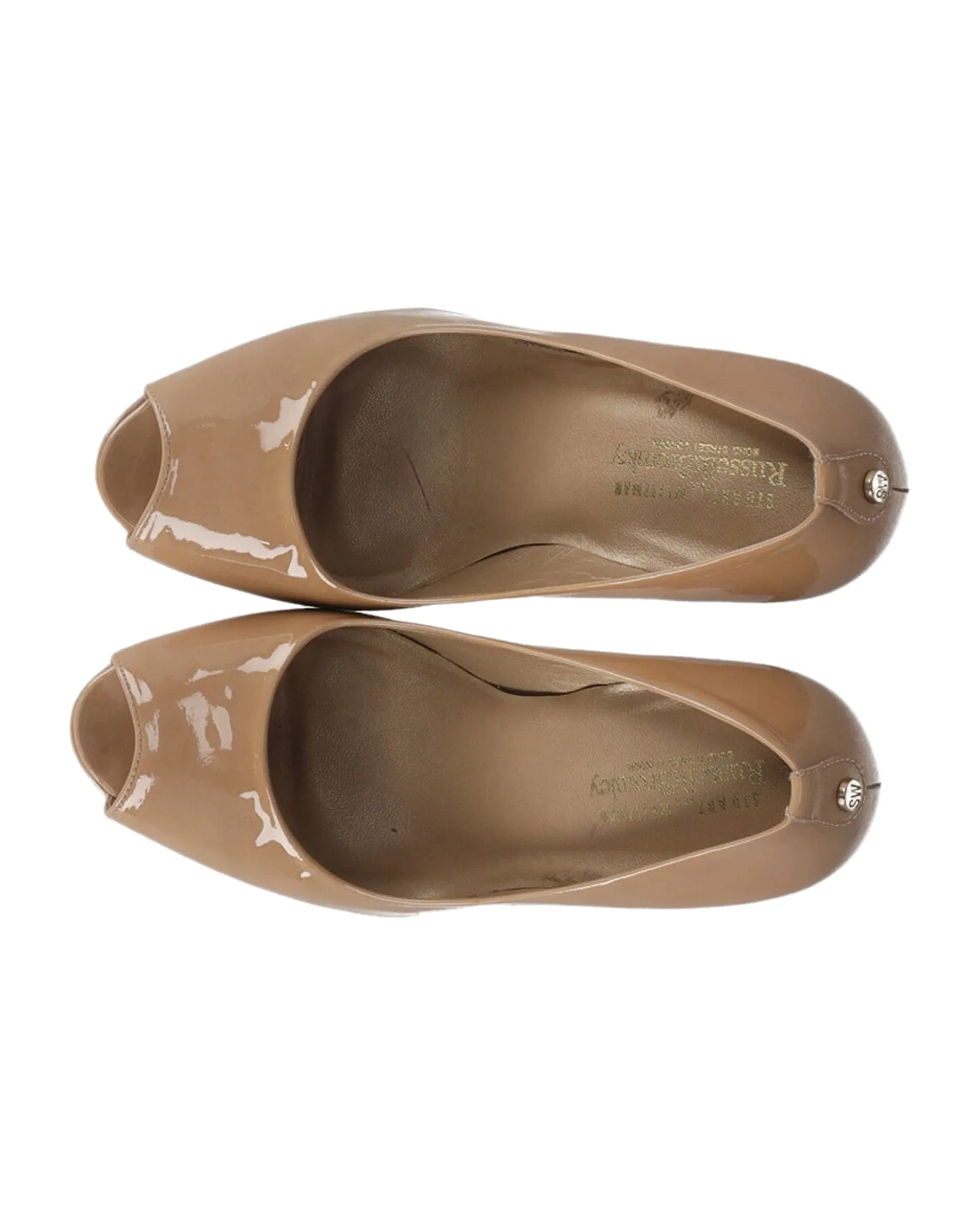 Stuart Weitzman Peep-Toe Pumps in Nude Patent Leather
