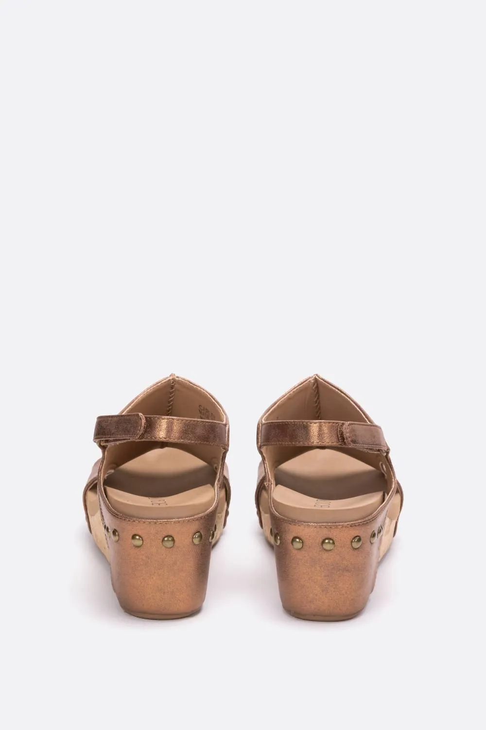 The Carley Faux Leather Wedge Sandal In Antique Bronze